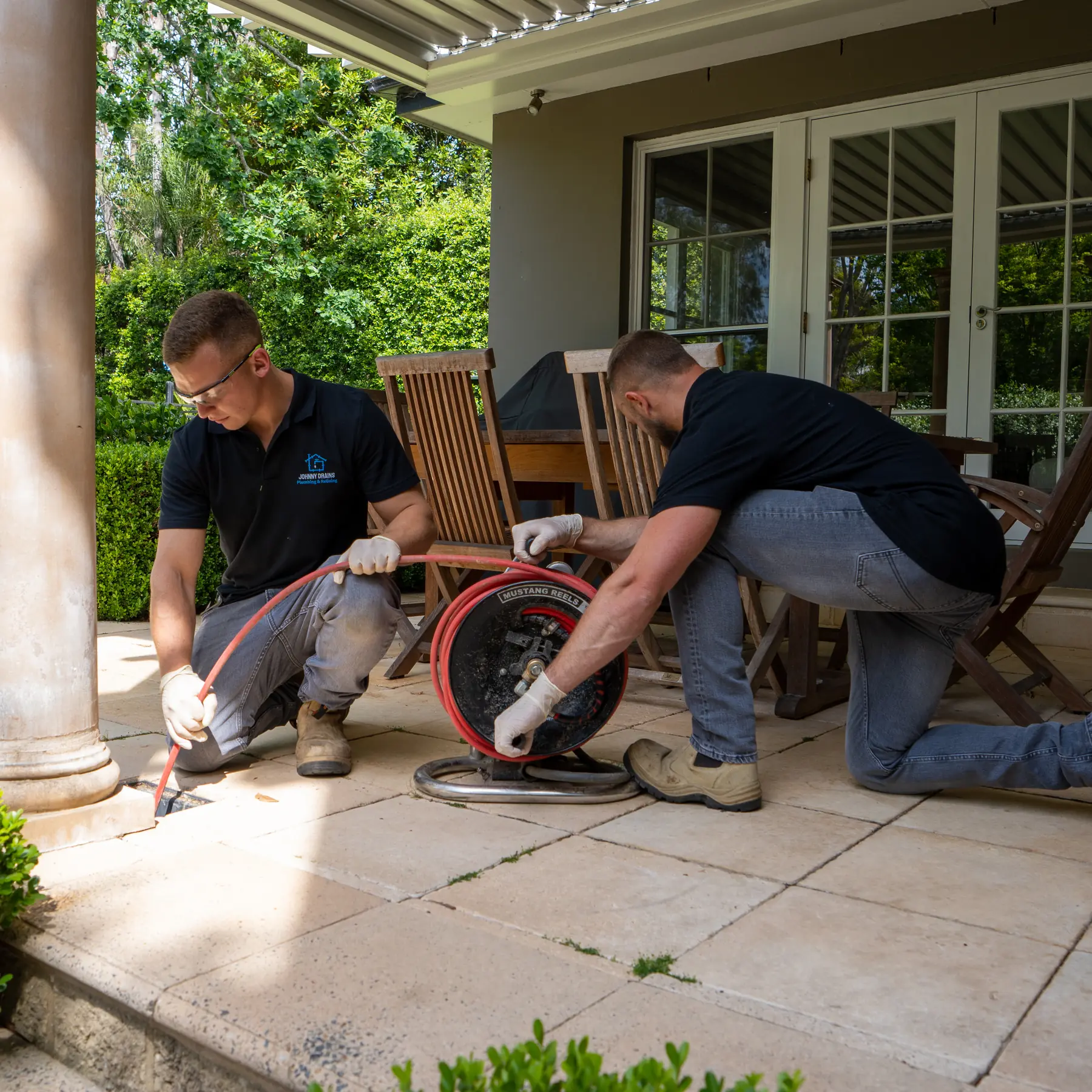 Johnny Drains team working on a blocked drain